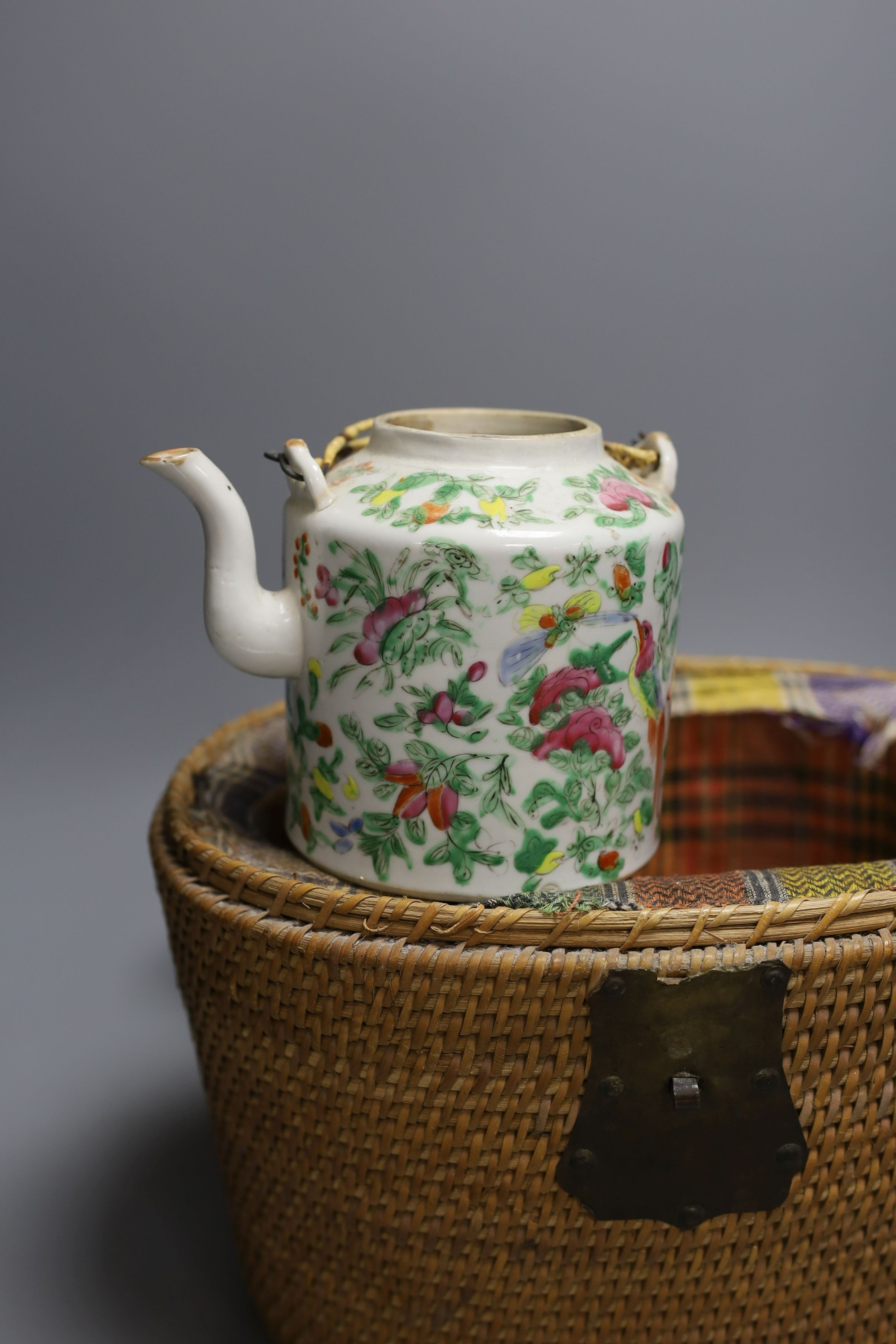 Two wicker-cased Chinese porcelain teapots together with a Chinese celadon dish and yellow vase, 28cm tall, (4)